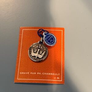 Silver Catholic medal of Holy Spirit from the 60s or 70s made in France.